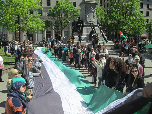 كندا : العلم الفلسطيني يجول في شوارع مونتريال في ذكرى النكبة الـ66