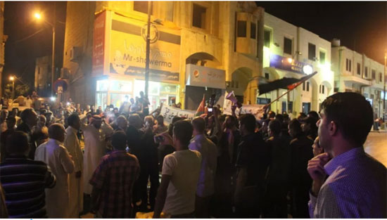 مسيرة ليلية في ذيبان للإفراج عن الهواوشة