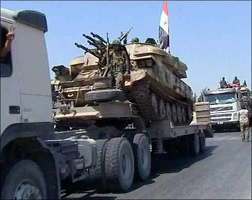 حشود بمئات الدبابات وعشرات العربات النظامية لـ " تحرير " درعا والحدود مع الأردن وإسرائيل حشود بمئات الدبابات وعشرات العربات النظامية لـ " تحرير " درعا والحدود مع الأردن وإسرائيل