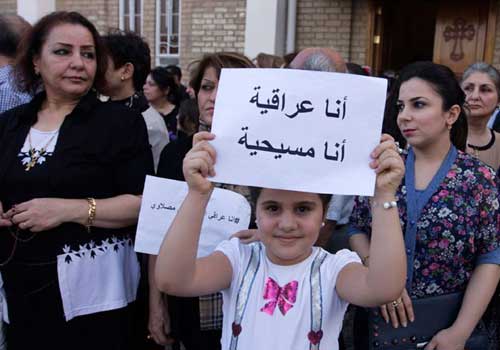 الأردن .. مسيحيو العراق يحتفلون في " كرفانات " اللجوء الأردن .. مسيحيو العراق يحتفلون في " كرفانات " اللجوء