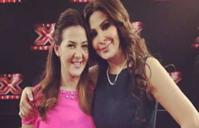 إليسا ترد بصورة على اتهامها بالغيرة من دنيا سمير غانم