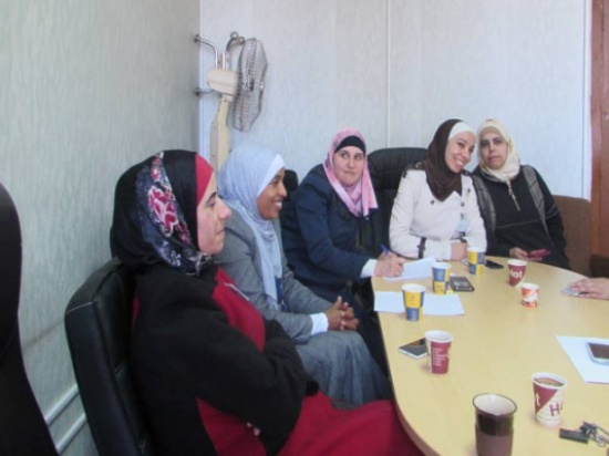 بالصور : " الاراضي والمساحة" تكرم المراةة في يومها