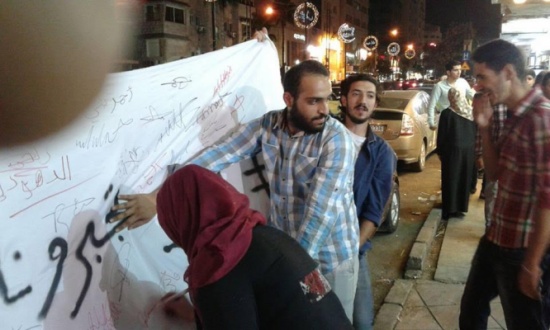 بالصور :  الانتهاء من التوقيع على أكبر جدارية أردنية ضد التطبيع