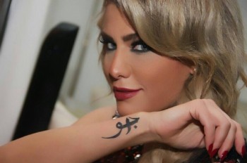 بالصور- جويل حاتم في عيد الشعانين مع جورج الراسي بالصور- جويل حاتم في عيد الشعانين مع جورج الراسي