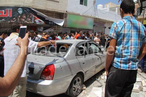 الرمثا: صرف شيكات للمتضررين من سقوط قذيفة بالسوق التجاري