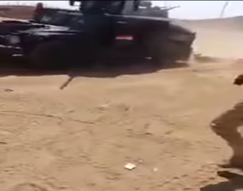 بالصور: القوات العراقية تسحل شابين من السنة بالهمرات بالصور: القوات العراقية تسحل شابين من السنة بالهمرات