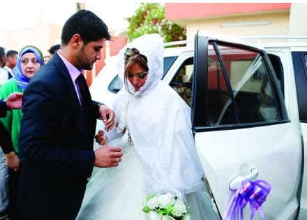 شيعي وسنية يتحديان «داعش» ويتزوجان في بغداد شيعي وسنية يتحديان «داعش» ويتزوجان في بغداد