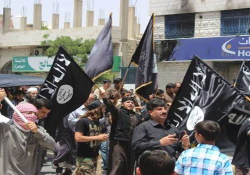 مسيرة تحيي "تنظيم داعش" وترفع راياته في معان مسيرة تحيي "تنظيم داعش" وترفع راياته في معان