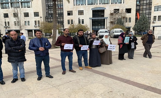 بالصور : اعتصام أمام أمانة عمان ضد نظام الأبنية
