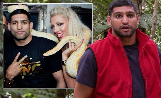 شاهد.. ملاكم عالمي يتعرض لموقف محرج أمام الملايين ويفقد أعصابه بسبب أفعى