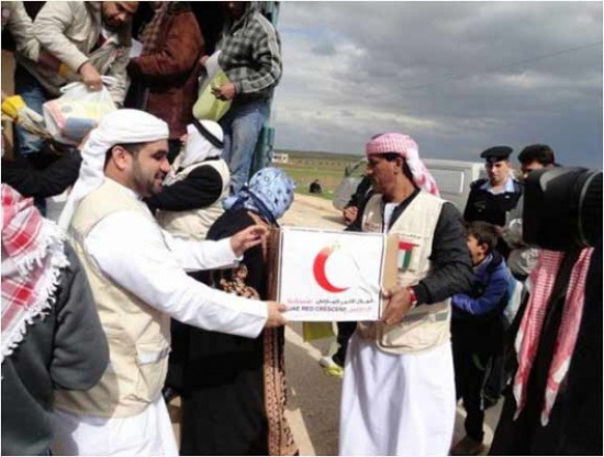 توزيع 8800 طرد غذائي على أسر سورية