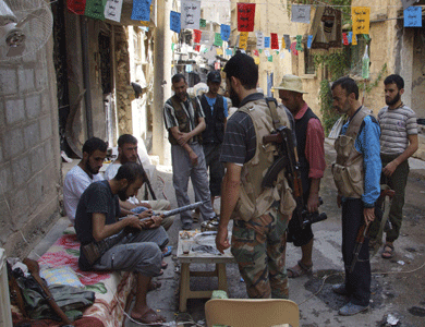 ديلي تلغراف: كاميرون تخلى عن خطط تسليح المعارضة السورية