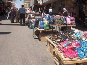 إجبار اصحاب المحال على انشاء " أرصفة " على نفقتهم