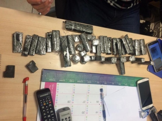 بالصور  : ضبط كيلو ونصف من الكوكائين في مطار الملكة علياء