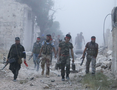 بدء انسحاب مقاتلي المعارضة من أحياء حمص السورية