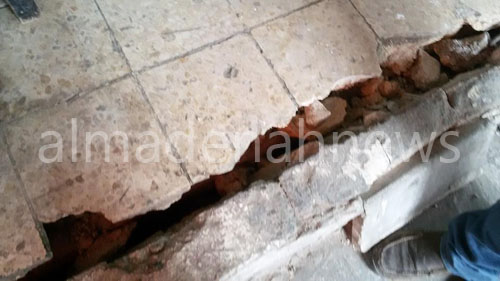 بالصور | جرش : لجنة لدراسة هبوط شارع سوف والابنية المحاذية