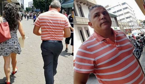 شاهد: ضبط رجل أثناء محاولته التقاط فيديو من أسفل فستان امرأة