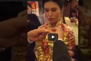 شاهد... عروس ترتدي ذهبا وزنه 5 كيلوجرامات