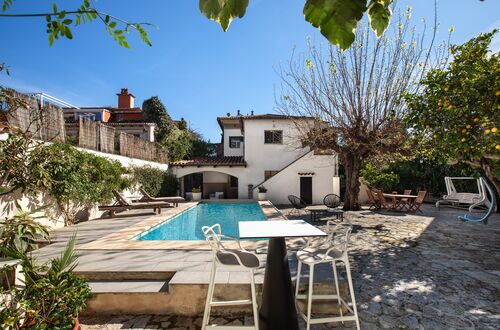 Stately 1940s villa with oasis garden and panoramic tower in Son Armadams