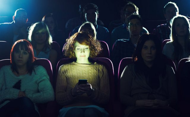 A new feature rumored to be in the next iOS update called Theater Mode could dim smartphone usage in cinemas.