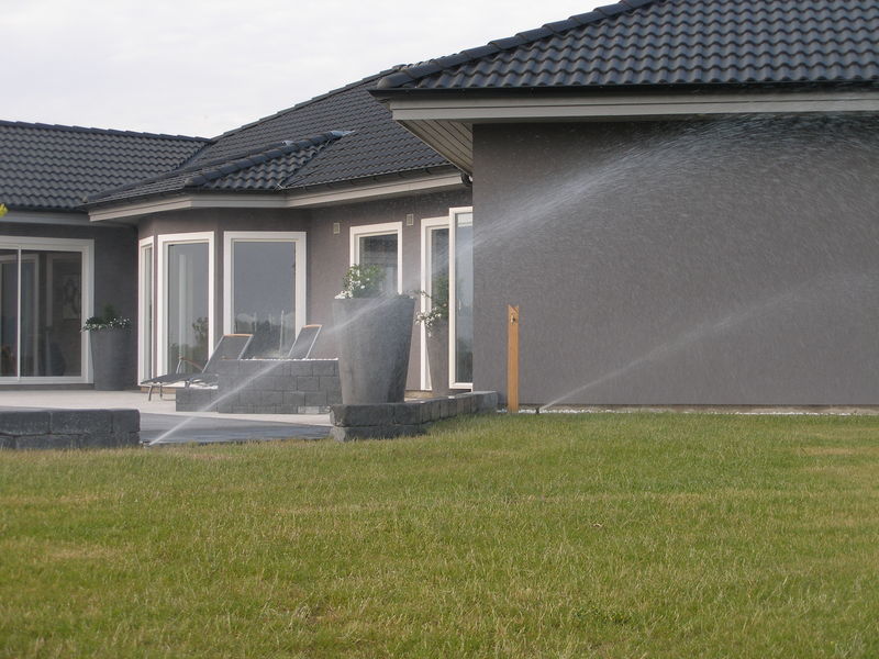 Pop-up bevattning i villaträdgråd