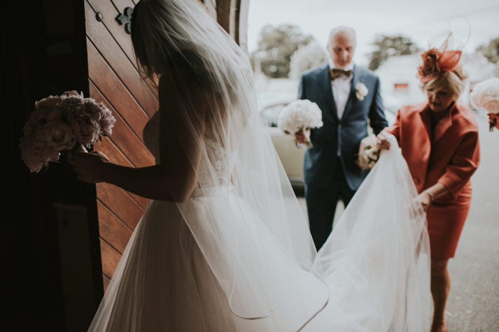 Orla entering the church. Wedding at Cloughjordan House