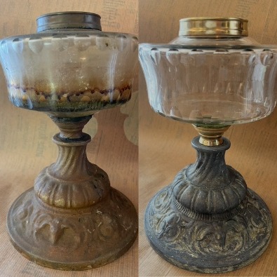 Gammal fot till fotogenlampa i zink som varit målad i tjocka lager