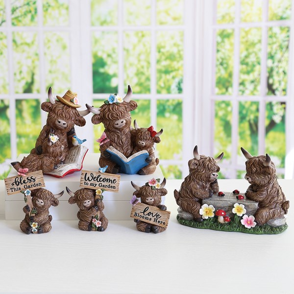 Highland Cow Reading 17cm 2 Assorted Highland Cow Reading 17cm 2 Assorted