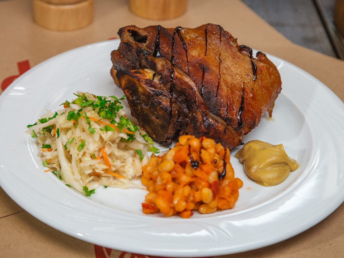 Pork knuckle with cabbage and beans Order Delivery Pork knuckle with