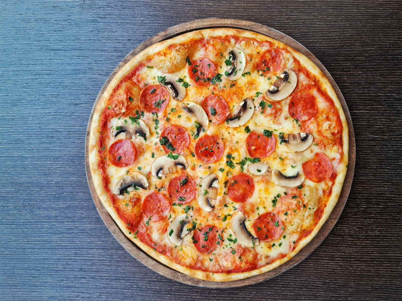 Pizza with pepperoni and mushrooms Order Delivery Pizza with