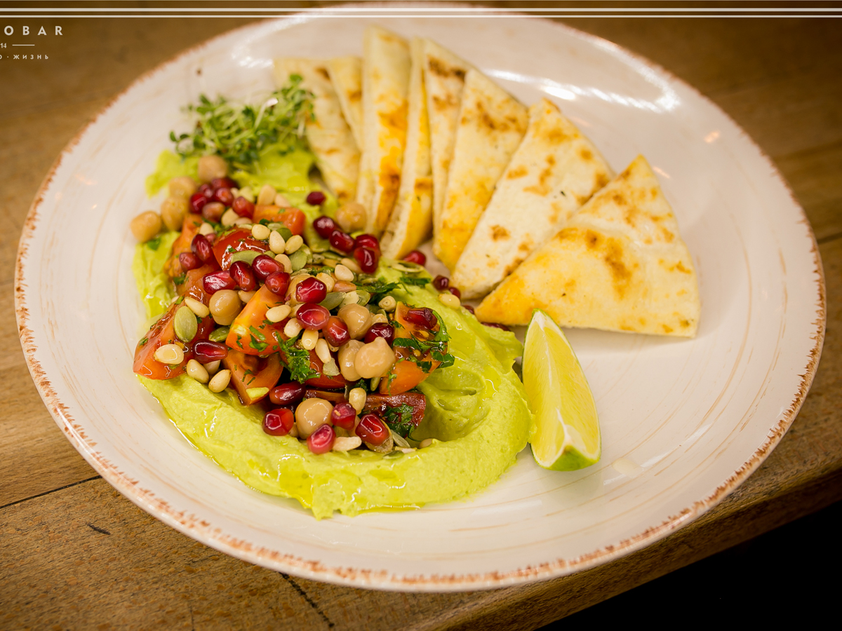 Avocado hummus with hot pita Order Delivery Avocado hummus with hot