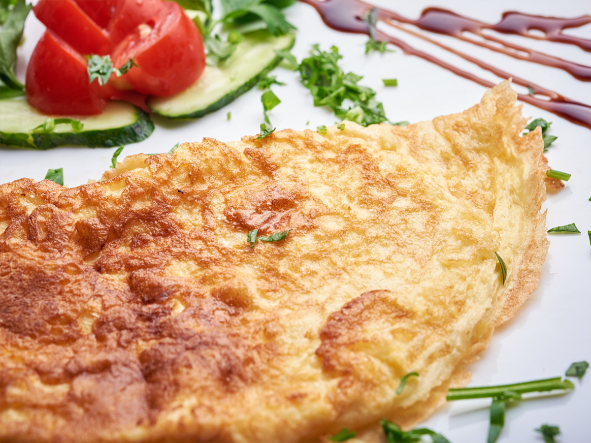 Omelet with mushrooms, cheese and ham Order Delivery Omelet with