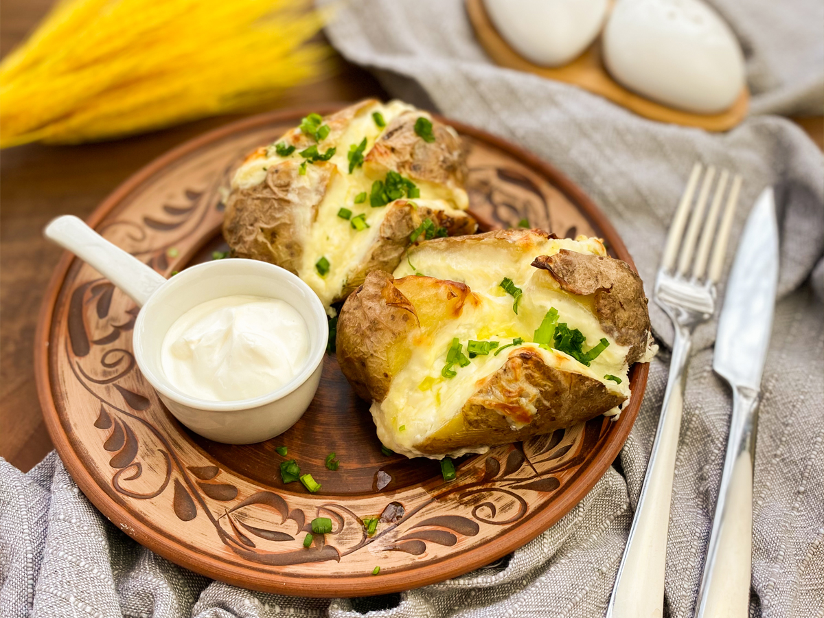 Baked potatoes with feta cheese and sour cream Order Delivery Baked