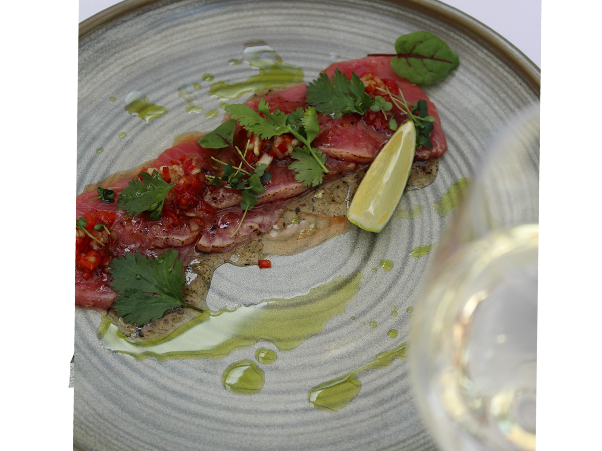Tuna carpaccio with truffle sauce and cucumber and pepper tartare