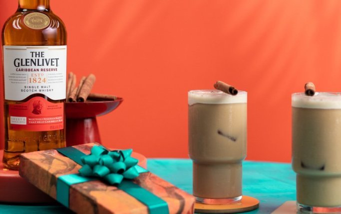 Celebración Cocktails Celebración Cocktails with a Caribbean Reserve bottle and a gift