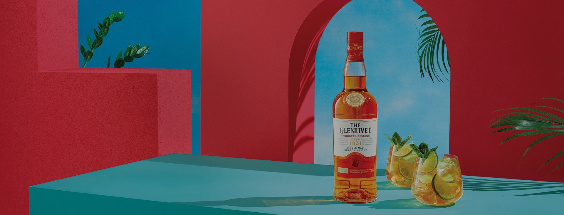 The Glenlivet Carribean Reserve Bottle The Glenlivet Carribean Reserve bottle with two cocktails