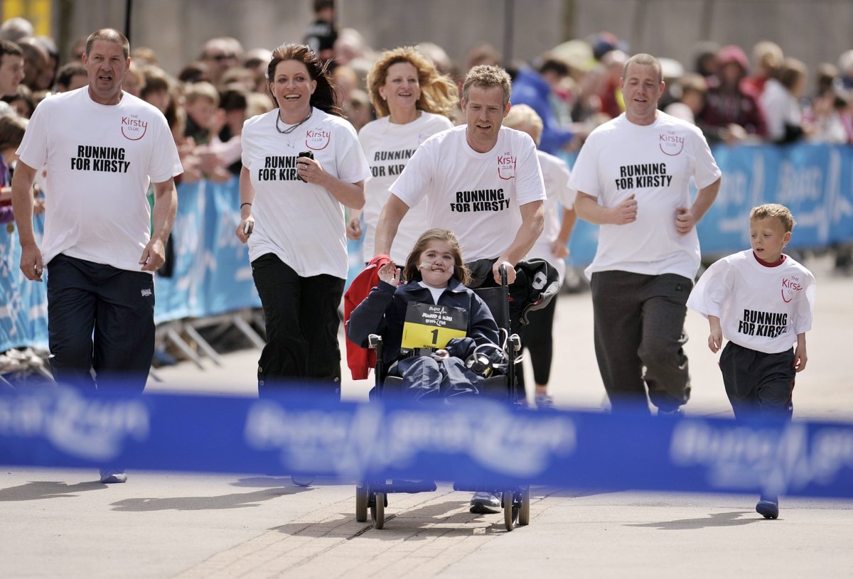 Kirsty & Team Crossing the Finish Line