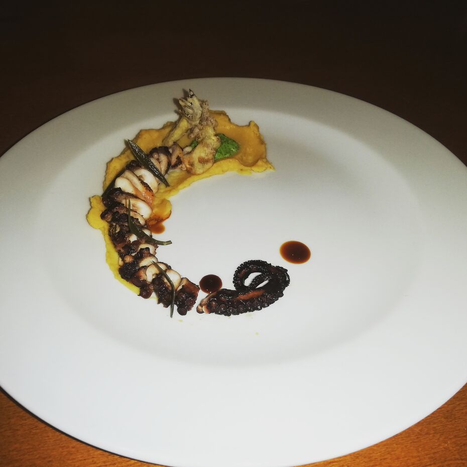 Braised octopus, daal, green harissa, fried artichoke, molasses sauce.jpg