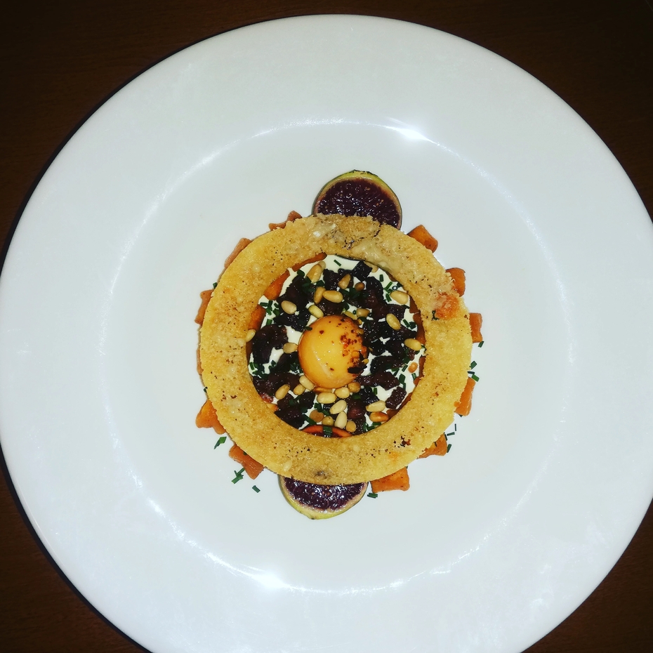 Sweet potato gniocchi, guanciale, figs, sage cream, pinenuts, chives, parmesan crisp, egg confit.jpg