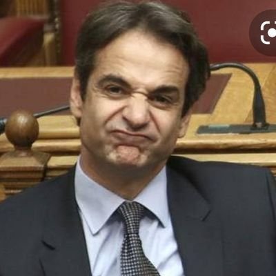 mitsotakis-xamogelo.jpg.8dfad6d7c1e04ca05931251f18f7d994.jpg