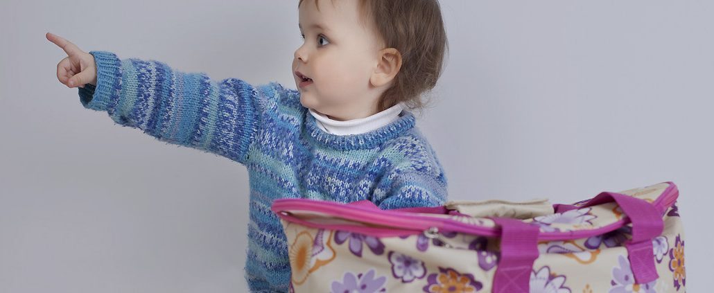 The baby playing with bag The baby playing with bag