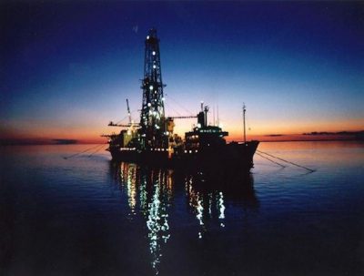 oil terminal in indoenesia with sunset in the background