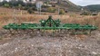 Cultivador - 25 brazos con rastra 
