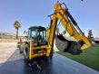 Retro Mixta Cargadora New Holland B110 4PT. 