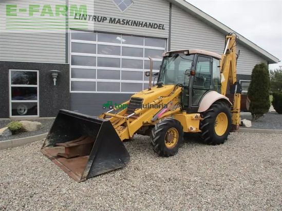 Excavadora - New Holland - nh 95 ps med stor frontskovl