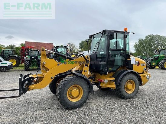 Minicargadora - Caterpillar - 907m mit garantie 1 jahr