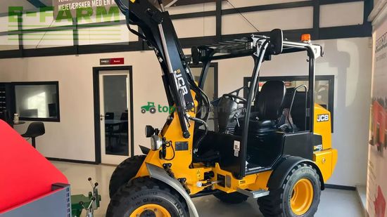 Minicargadora - JCB - 403 plus agri med jst skovl og pallegaffel