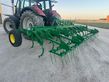 Cultivador Gil de 21 brazos con rastra de muelles