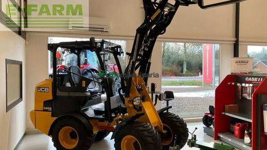 Minicargadora - JCB - 403 plus agri med jst skovl og pallegaffel