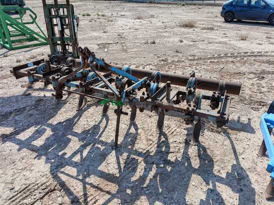 Cultivador agrícola de 13 brazos fijos con rastrillo